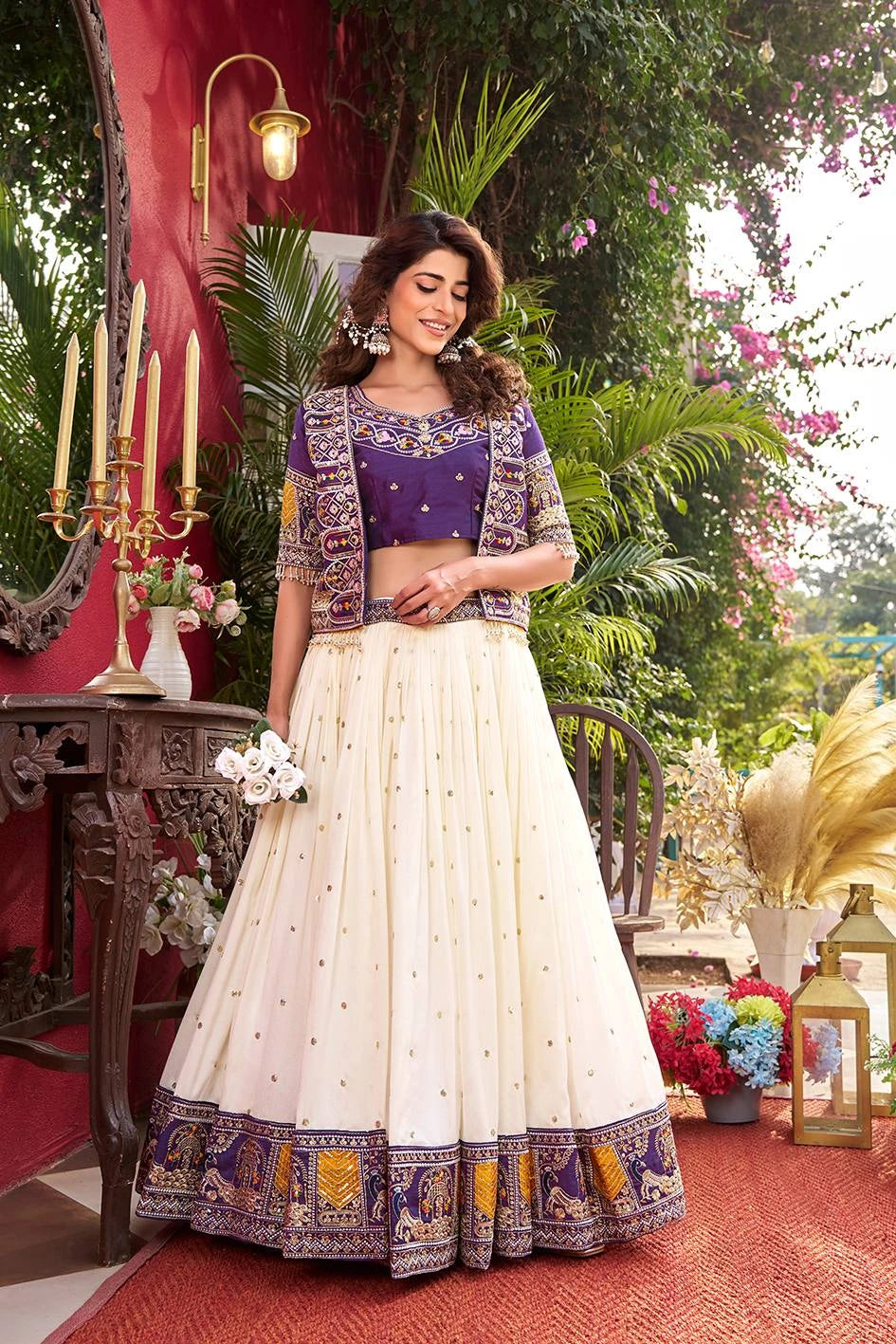 Woman in traditional outfit with floral decorations in an outdoor setting