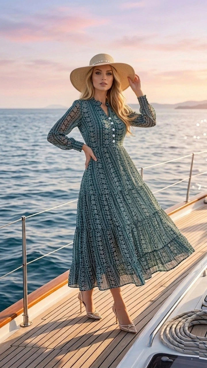 Woman in a green dress and sun hat on a boat at sunset