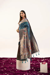 Woman wearing a saree with a white background