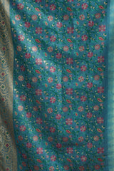 Floral patterned fabric with pink flowers on a blue background