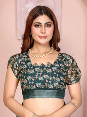 Blouse piece close-up of Tropical Green Digital Floral Print Saree showing dark teal printed running blouse with puff sleeves