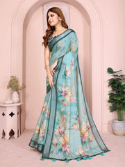 Side view of Tropical Green Digital Floral Print Linen Cotton Saree showing contrast border and teal tassel trim