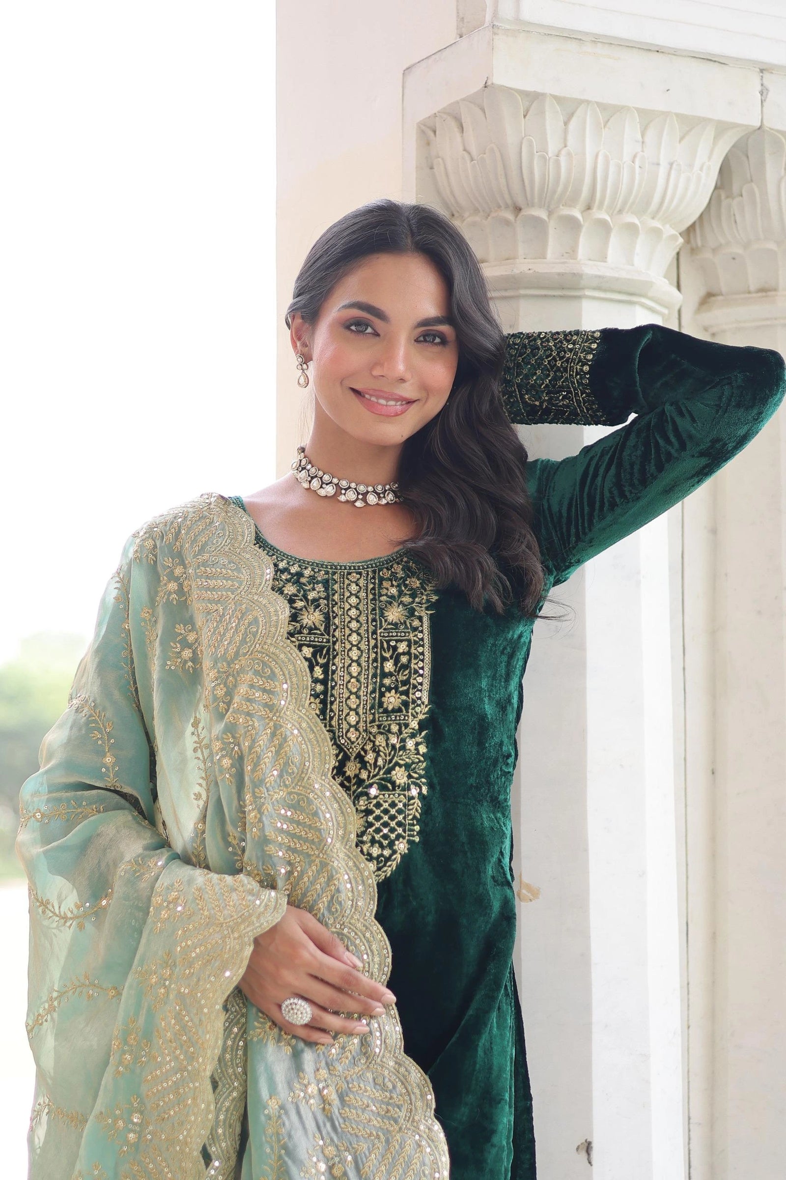 Sophisticated blue kurta with heavy embroidered panel, paired with matching trousers and a delicately embellished dupatta.