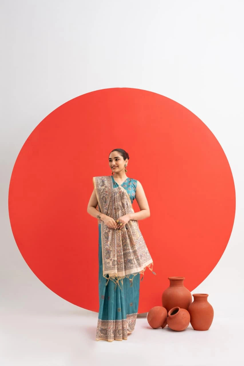 Woman in a traditional outfit standing next to earthen pots against a white background with a large red circle.