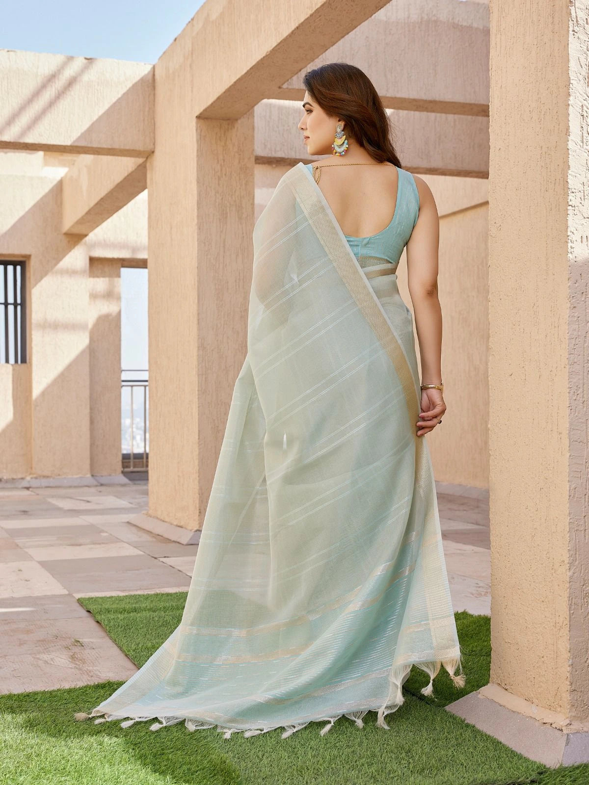 sea green art linen silk saree with zari weaving work