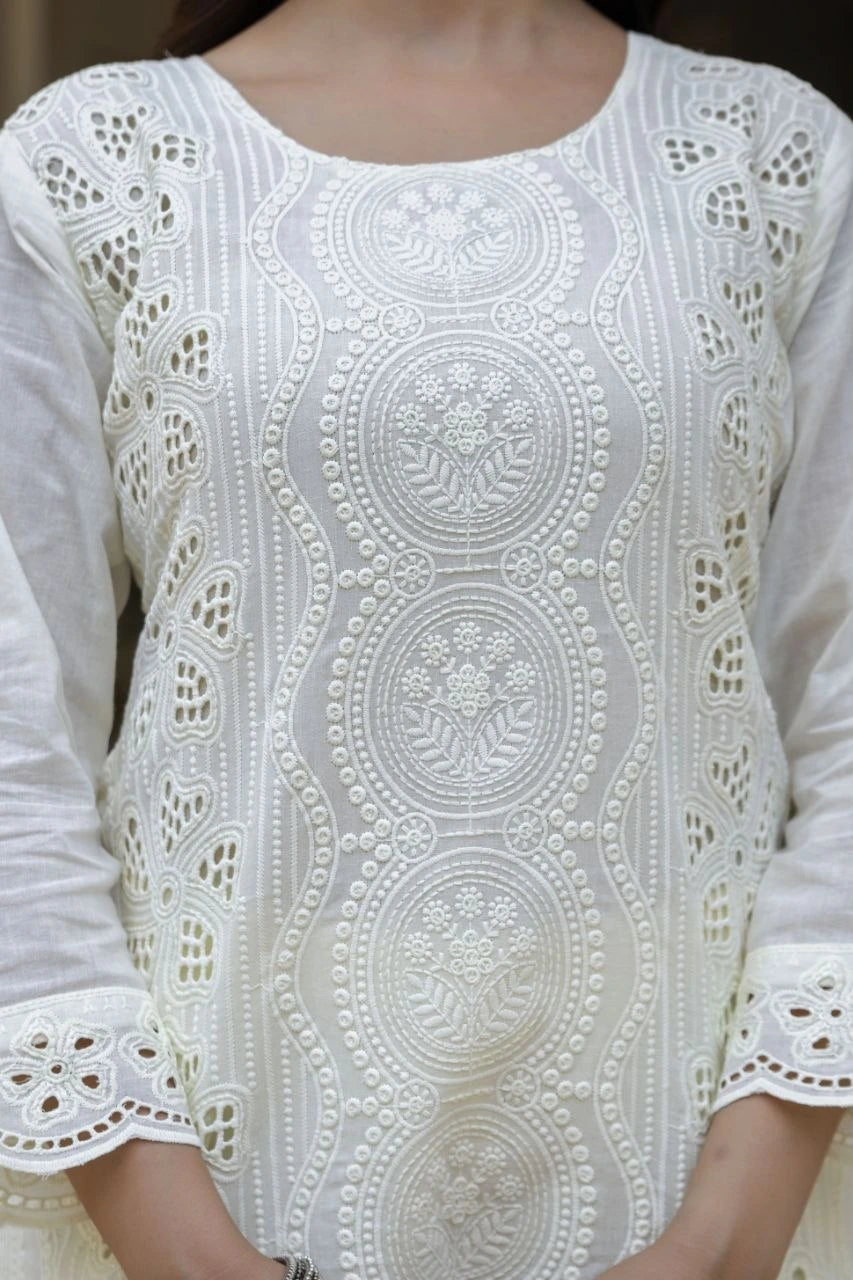 White embroidered top with intricate patterns