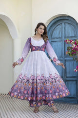 Designer floral suit set in soothing lavender tones with vibrant botanical prints, paired with matching bottoms and a stylish dupatta.
