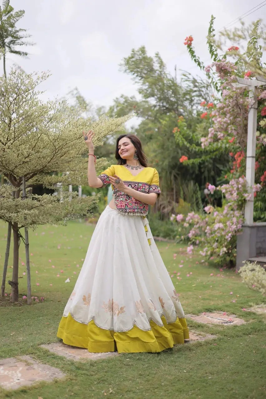 Premium White Lehenga Choli with Multicolor Tribal Embroidery and Rich Traditional Craftsmanship