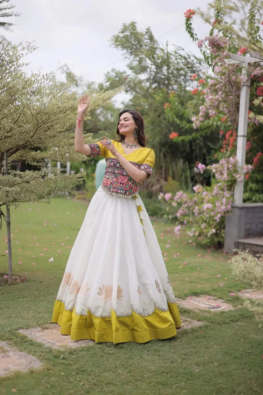 Gorgeous Ivory White Ethnic Lehenga with Decorative Lotus Motifs, Vibrant Embroidered Blouse, and Timeless Indian Fashion