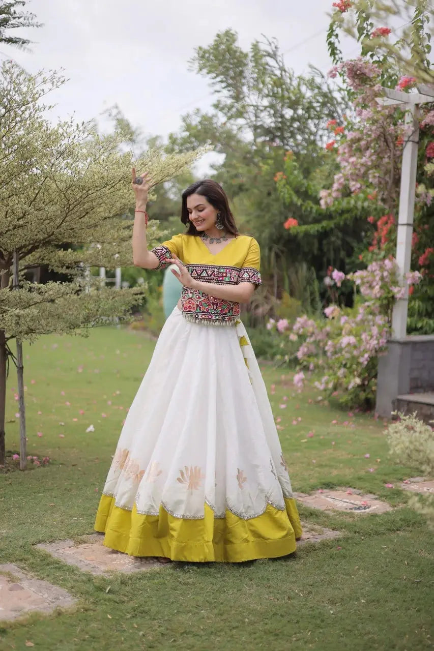 Designer White Lehenga Choli with Colorful Handcrafted Embroidery, Mustard Yellow Border, and Festive Wear Appeal