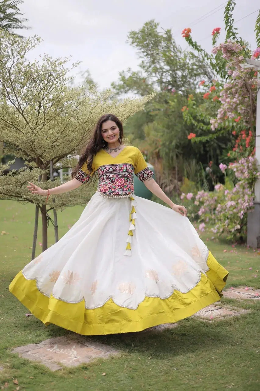 Elegant Ivory White Flared Lehenga Set with Artisan Embroidered Bodice, Contrast Yellow Hem, and Traditional Look