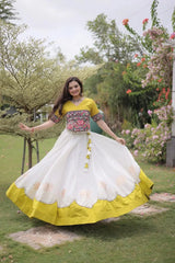 Elegant Ivory White Flared Lehenga Set with Artisan Embroidered Bodice, Contrast Yellow Hem, and Traditional Look