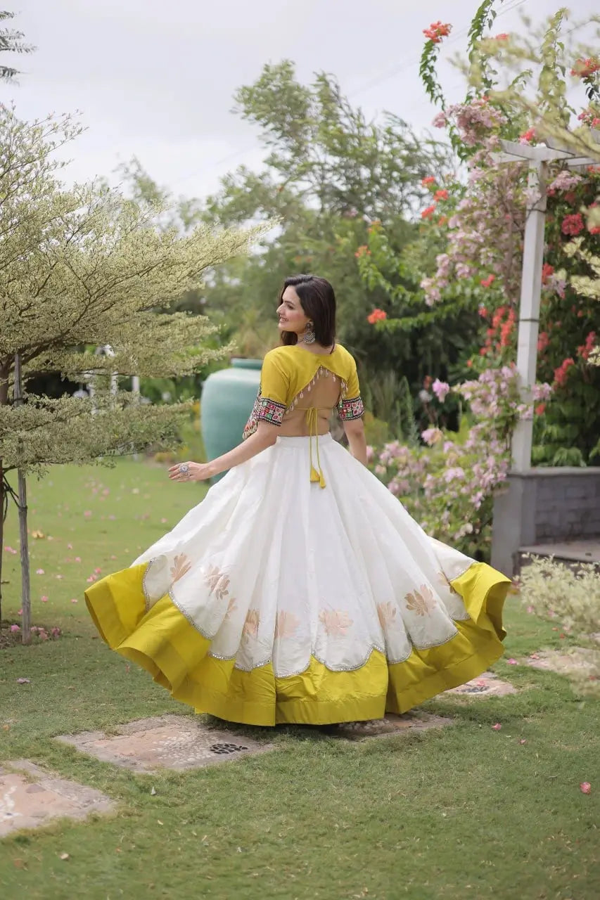 Beautiful Ivory White Ethnic Lehenga with Intricate Embroidered Choli, Lotus Motifs, and Elegant Flared Skirt