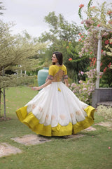 Beautiful Ivory White Ethnic Lehenga with Intricate Embroidered Choli, Lotus Motifs, and Elegant Flared Skirt
