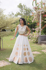 Designer festive lehenga crafted with shimmering mirror embellishments and premium fabric for a graceful ethnic look.