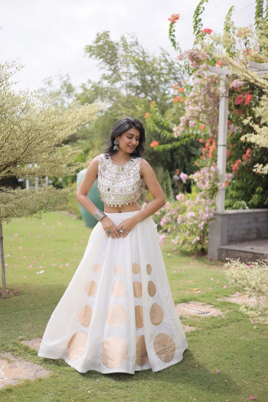 Fashion-forward white designer lehenga blends classic Indian craftsmanship with modern ethnic elegance.