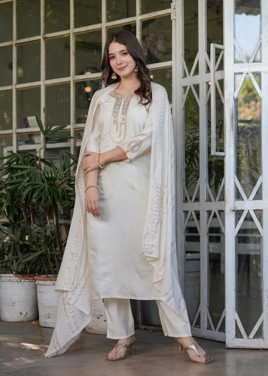 White heavy Chanderi silk kurti with intricate thread embroidery and zari work displayed on mannequin.