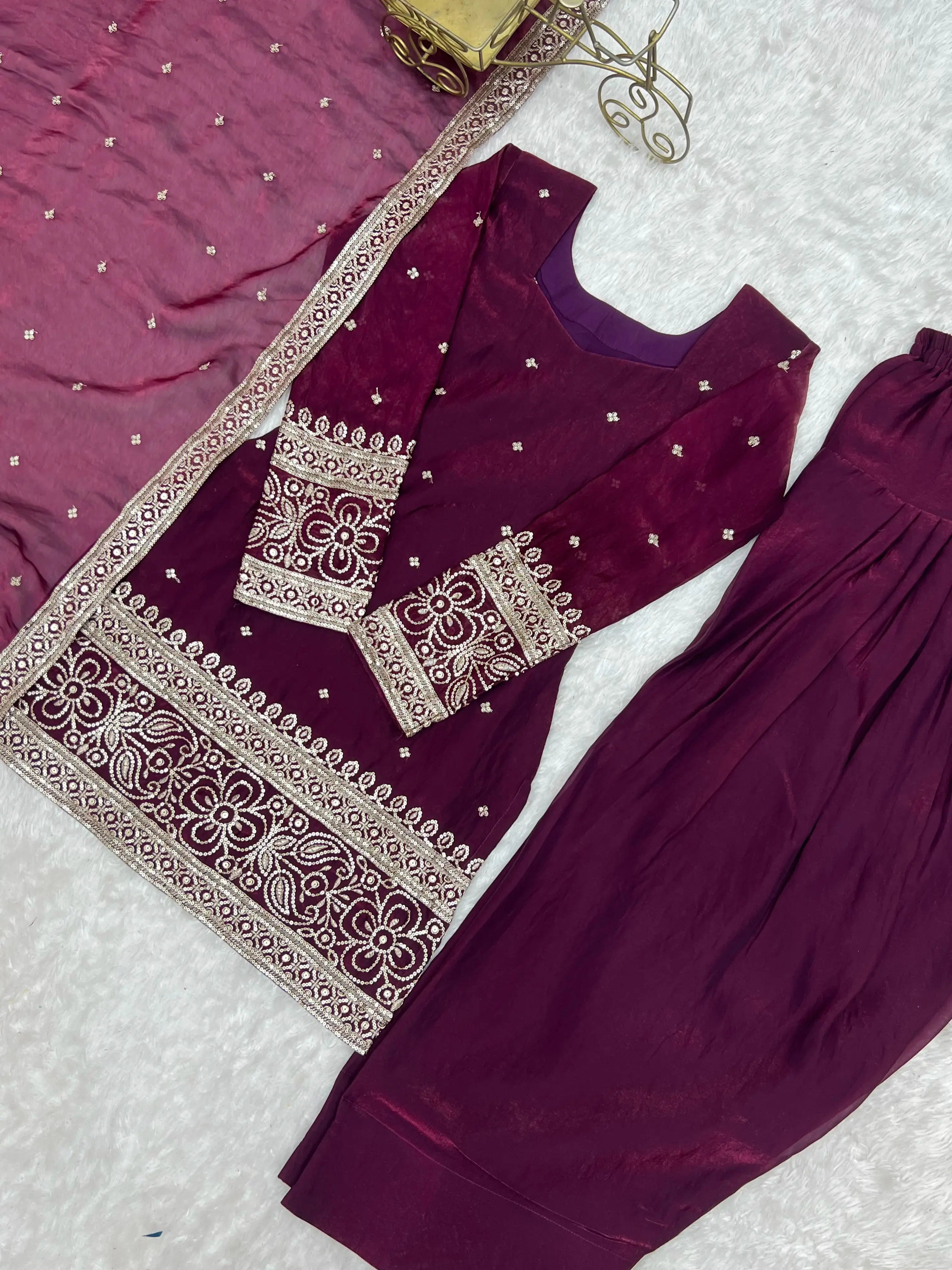 Wine Shalwar Suit Flat Lay – Kurta Hem and Sleeve Embroidery Close Up
