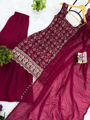 Maroon traditional outfit with floral embroidery on a white background