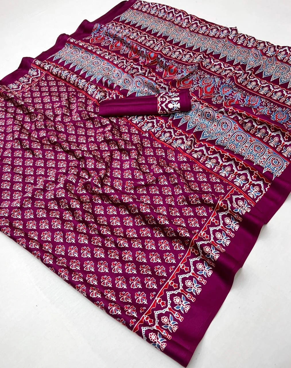Purple patterned fabric with a white background