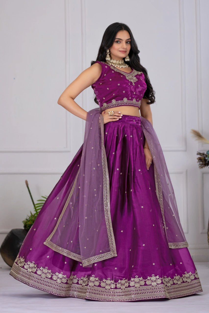 Woman wearing a purple traditional outfit with a white background