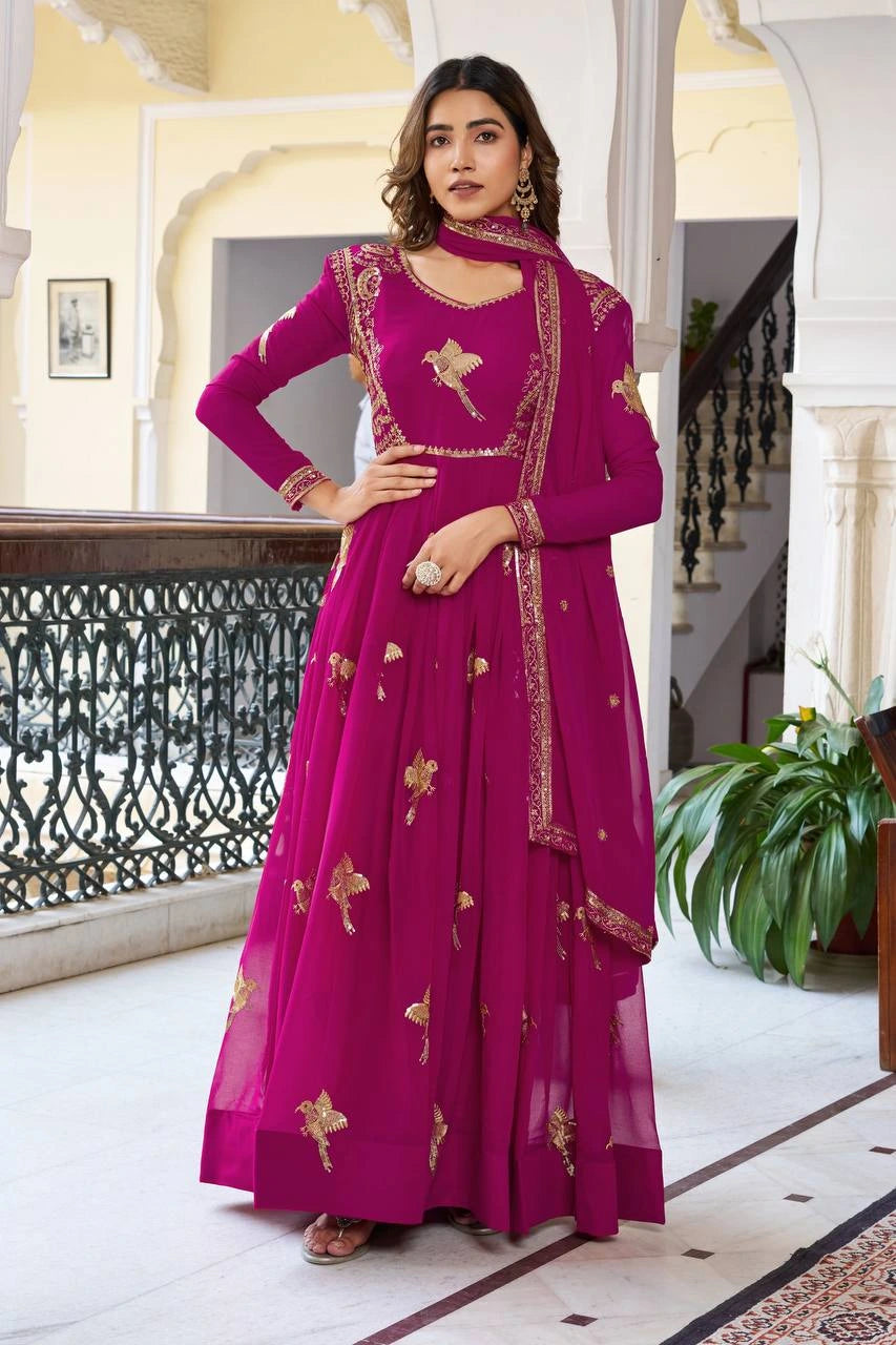 Elegant wine suit featuring shimmering sequins and delicate thread work design