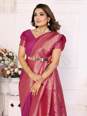 Woman wearing a pink saree with a white background