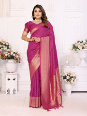 Woman wearing a pink saree with a white background