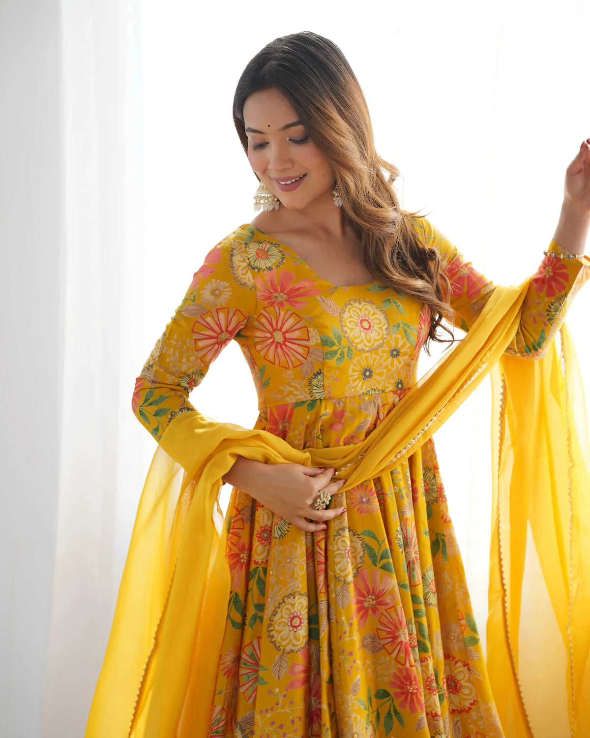 Close-up of Yellow Discharge Print Suit dupatta and sleeve