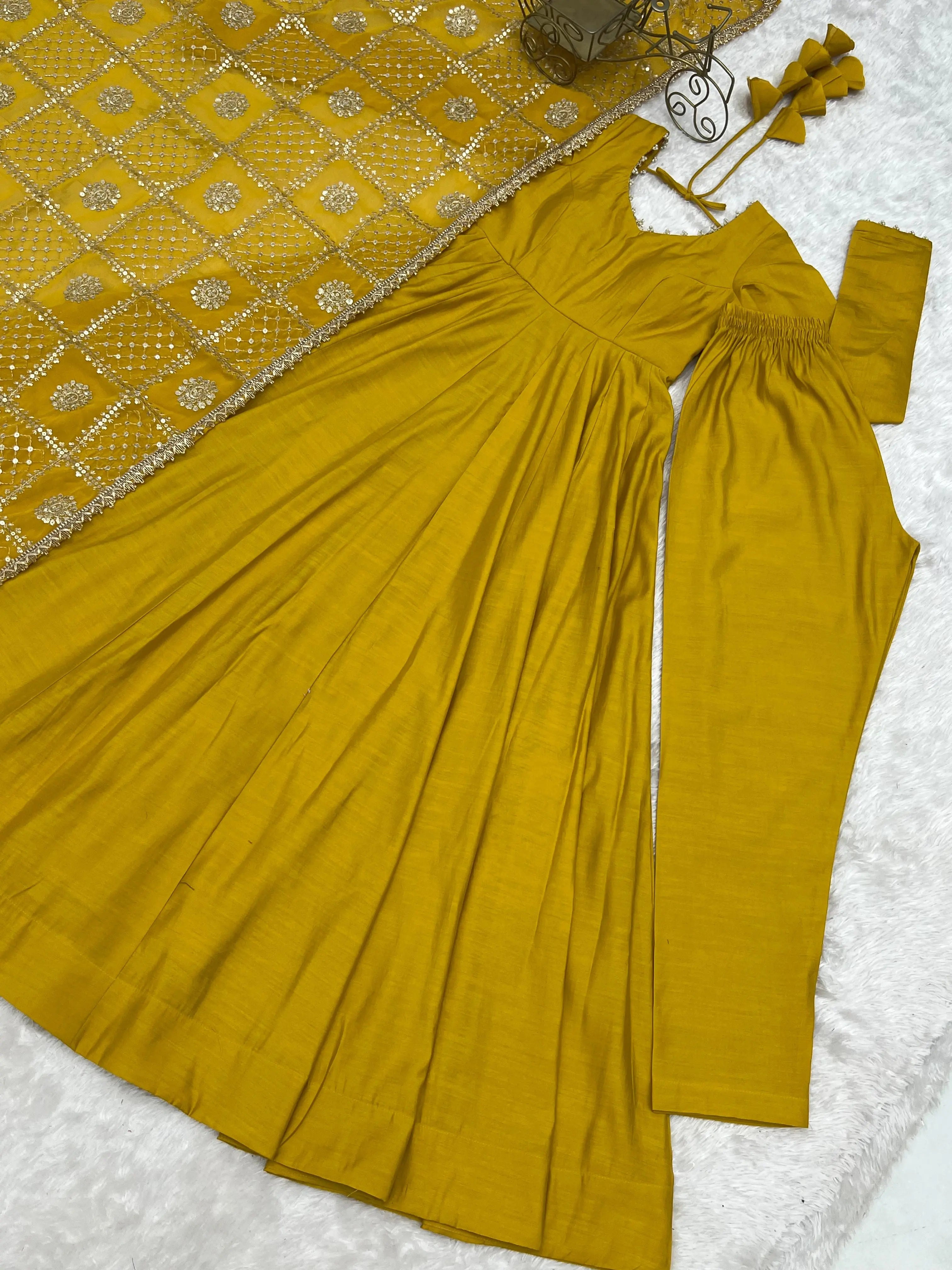 Flat lay of complete Yellow Sequins Embroidered Anarkali Suit set with pant and dupatta