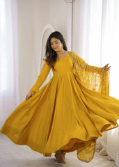 Yellow Sequins Embroidered Anarkali Suit twirling with dupatta flying