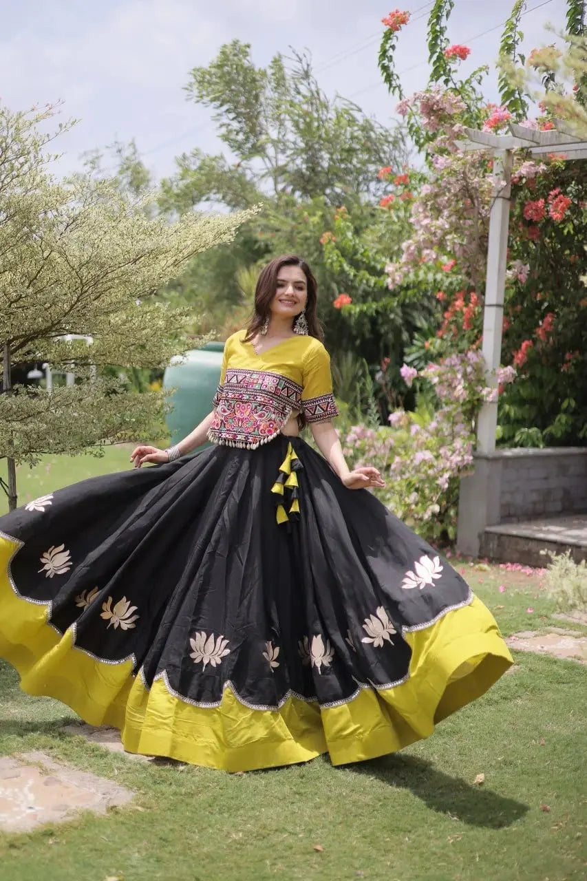 Designer Black Lehenga Set featuring Mustard Yellow Embroidered Blouse, Multicolor Artisan Motifs, and Contrast Border