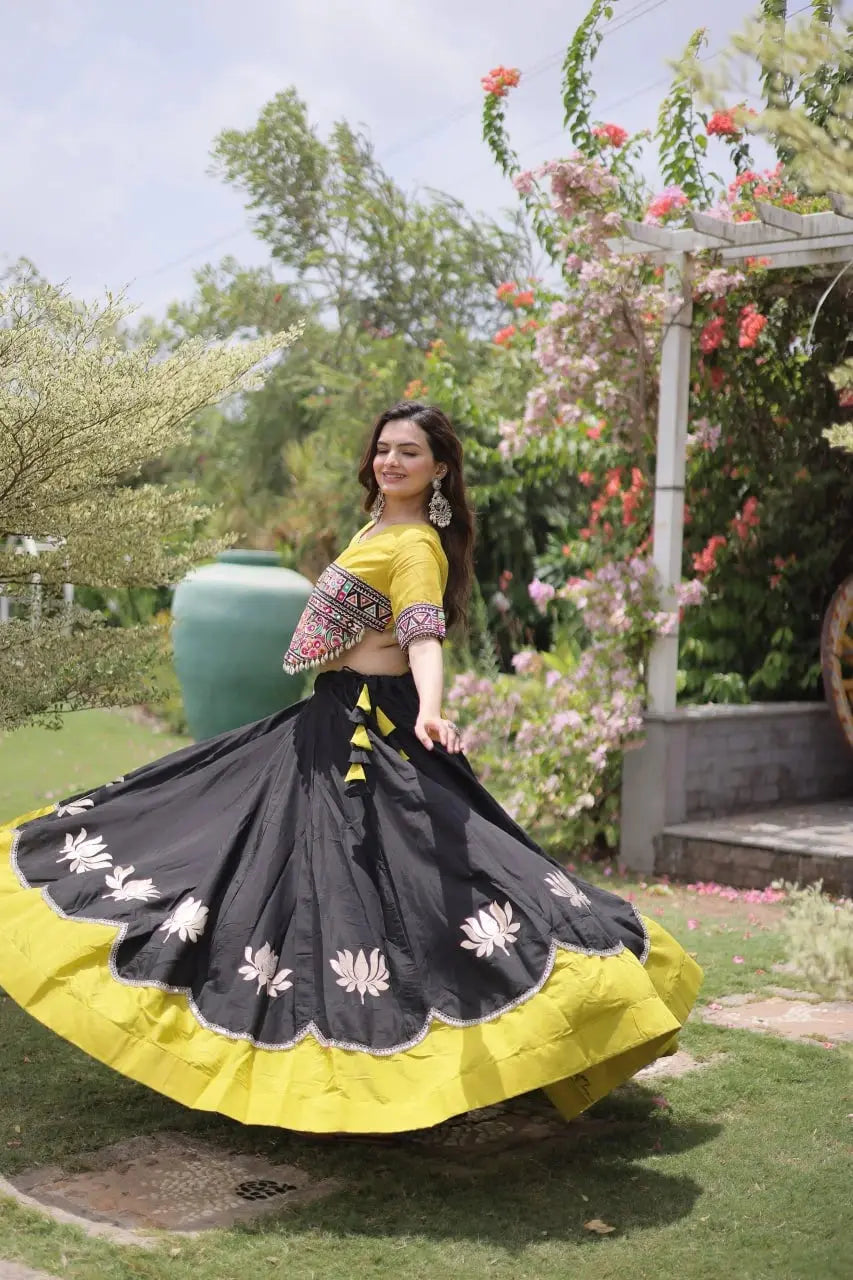 Designer Black Lehenga Choli with Colorful Handcrafted Embroidery, Mustard Yellow Border, and Festive Wear Appeal