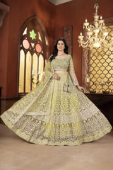 Woman in a traditional embroidered outfit standing in a room with decorative walls and a chandelier.