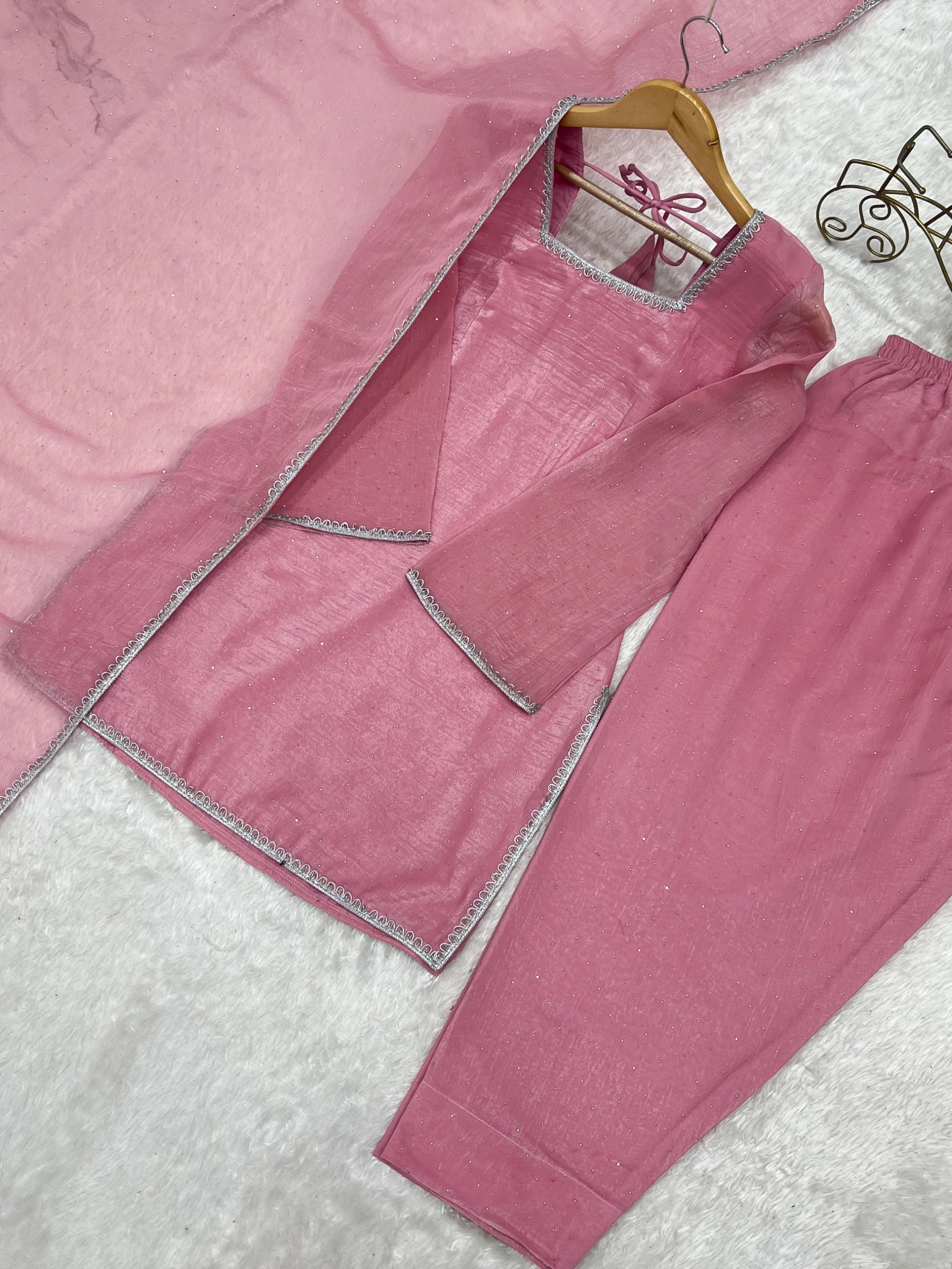 Baby pink suit flat lay - kurta, pant and dupatta