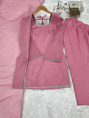 Baby pink suit flat lay - lace border detail