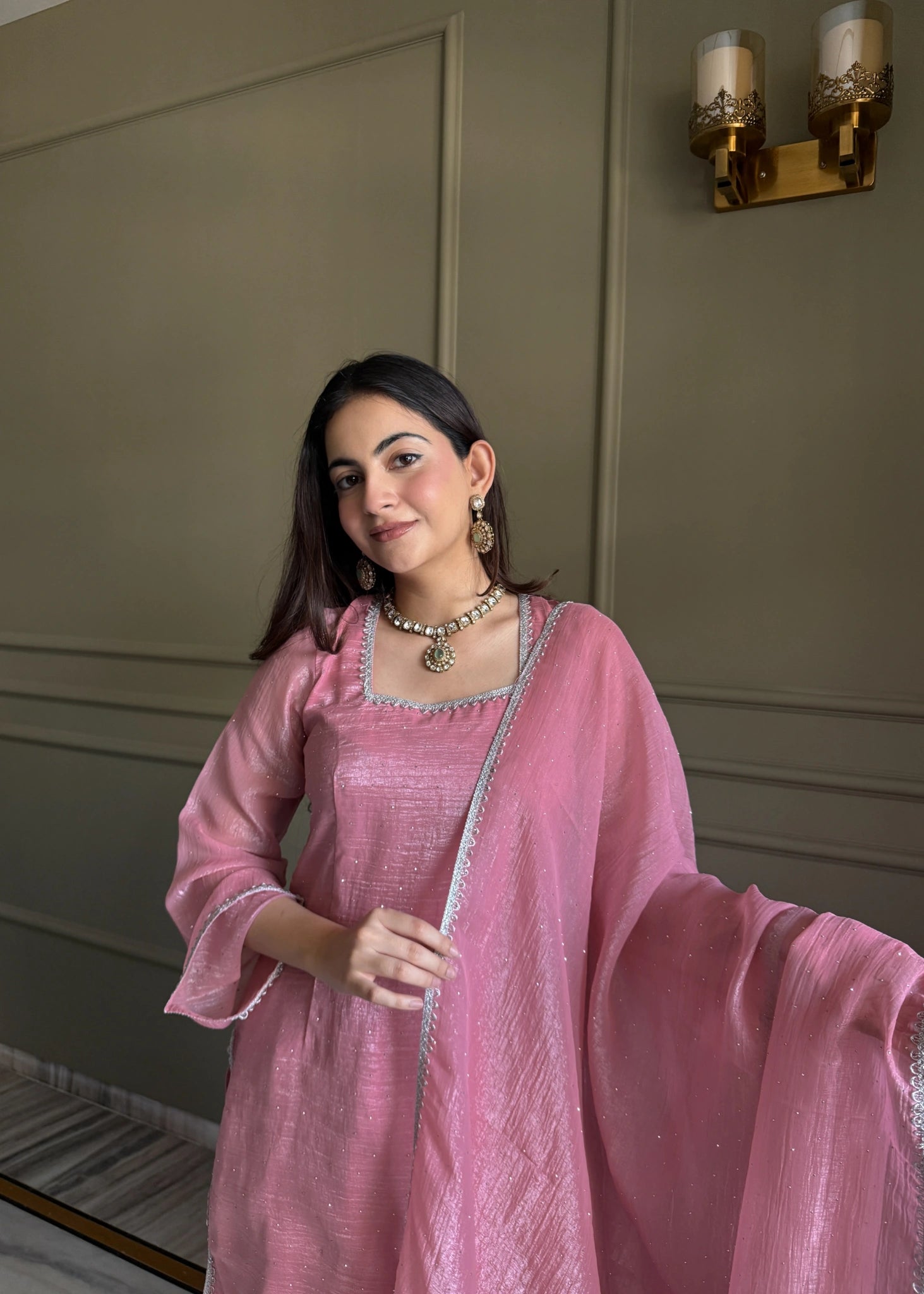 Baby pink suit - neckline and sleeve close up