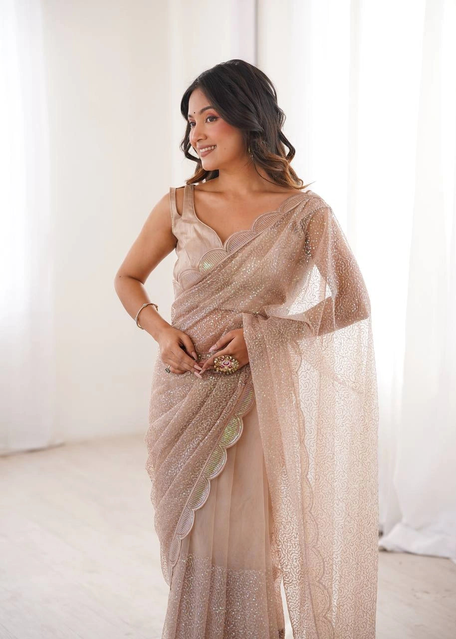 Beige Net Saree with Sequins and Thread Work – Heavy Party Wear