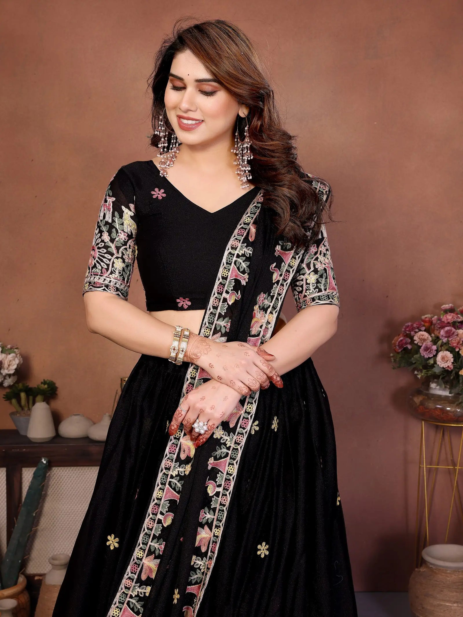Black Embroidered Lehenga editorial side pose V-neck choli – Kalyanja KL171
