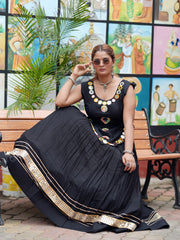 Black Gota Patti Lehenga Dramatic Bench Pose – KL199 – Kalyanja