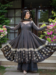 Black Anarkali Suit arms spread showing dramatic flair with floral booti border