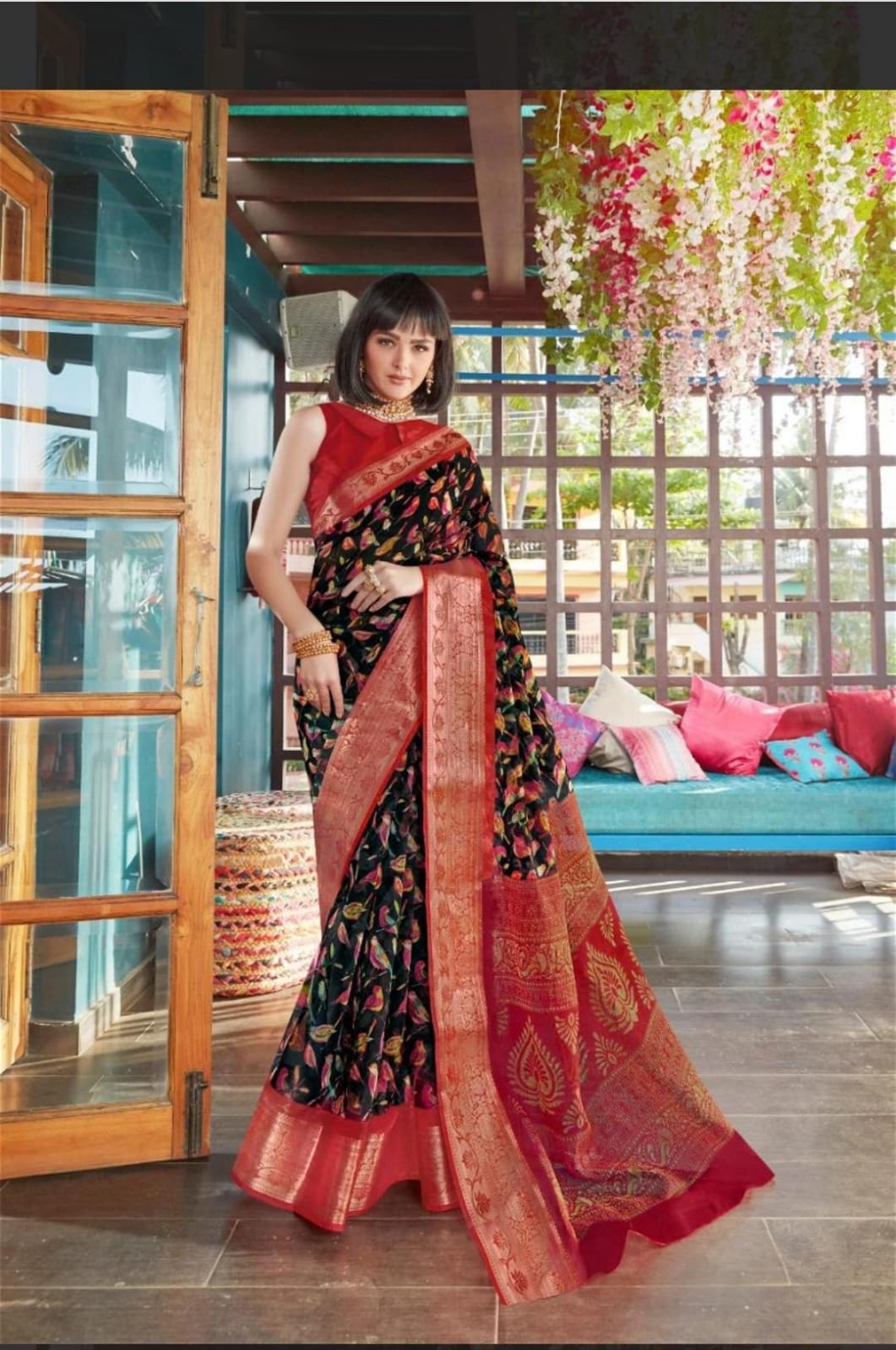 Elegant black saree with intricate zari work on soft linen cotton fabric for traditional occasions