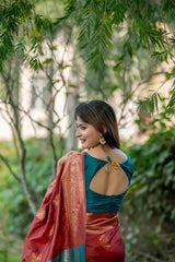 Brown saree with zari work and contrasting teal blouse
