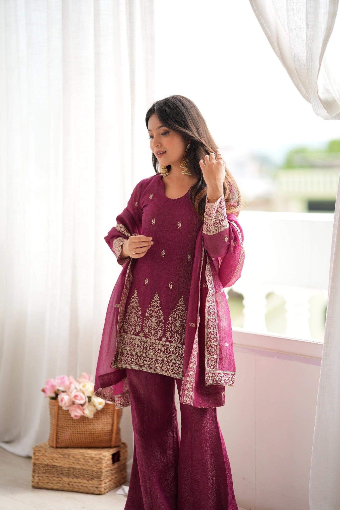 Burgundy sequins embroidered with zari work suit with bell bottom pant and dupatta - front view