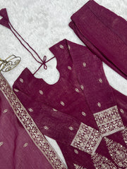 Burgundy suit flat lay - cuff embroidery detail