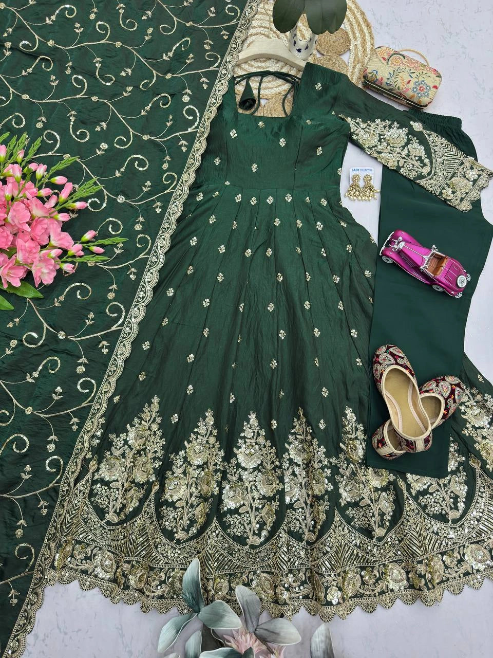 Dark Green Anarkali Suit flatlay hem codding embroidery close up KU267