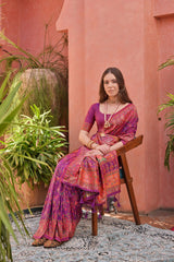 Woman in dark pink Kashmiri Jal weaving saree with rich ethnic patterns and classic Indian accessories