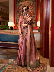 Woman in dark pink zari work saree with embroidered blouse and statement jewelry showcasing modern ethnic fashion