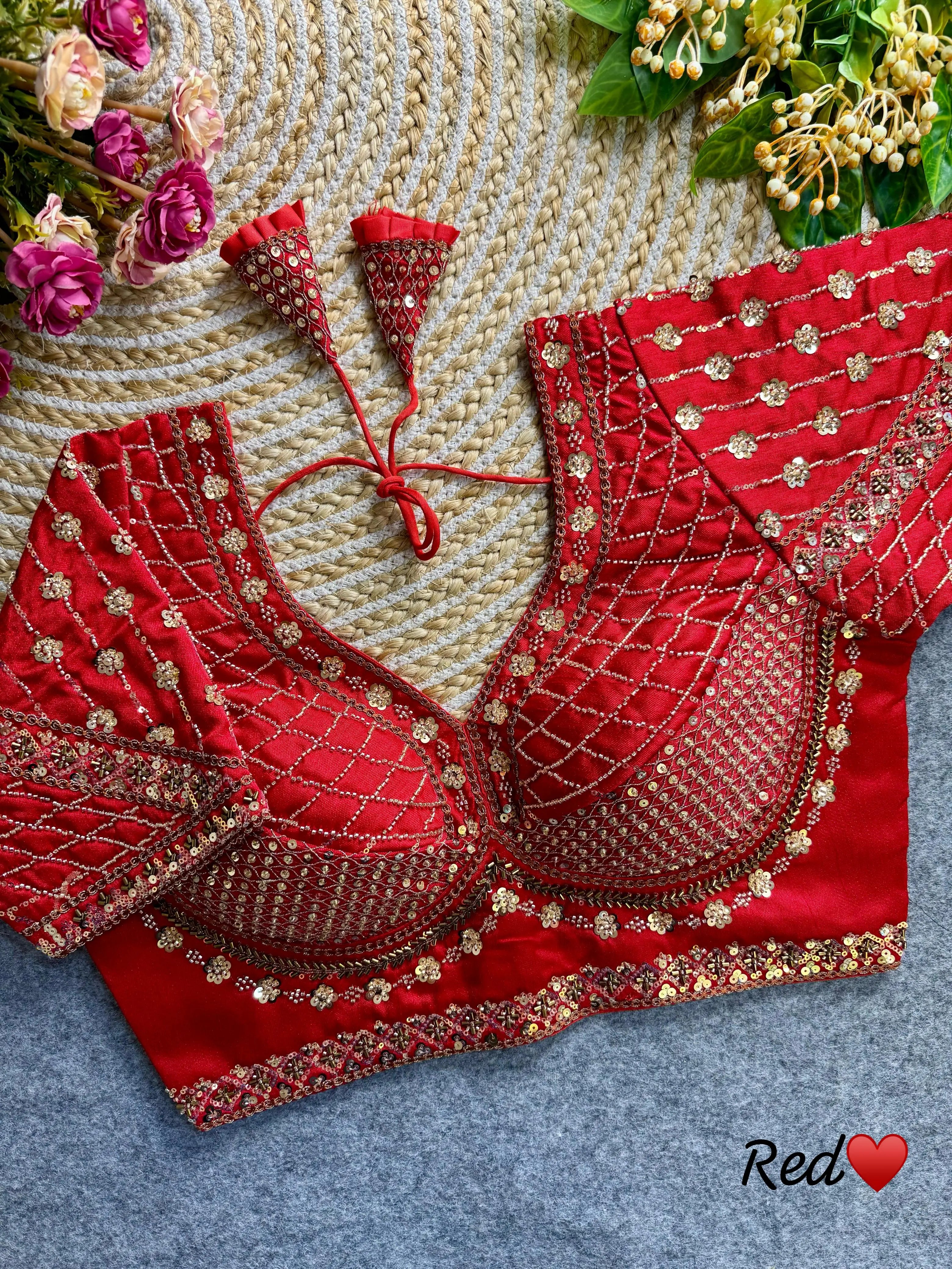 Dark red soft silk blouse featuring intricate sequence and codding thread work design.