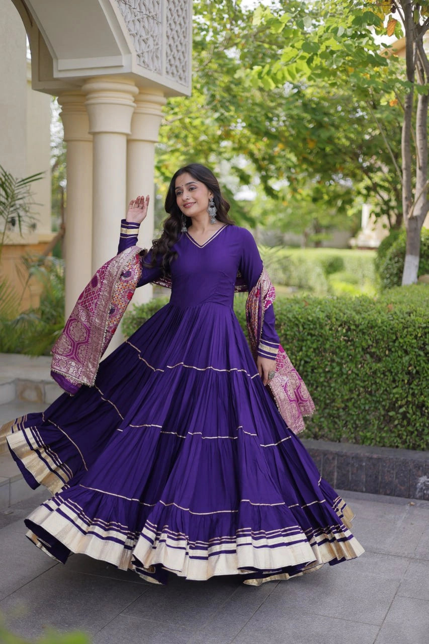 Deep Purple Anarkali Suit spinning with Banarasi dupatta spread wide showing brocade